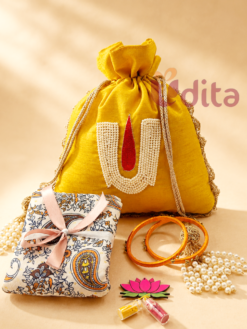 Yellow pearl Tirunamam designer potli return gift combo with Kalamkari blouse piece, silk thread bangles, and lotus haldi kumkum set for Varalakshmi Vratham