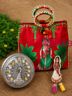 Half Saree Ceremony return gift combo featuring a printed designer handle bag, meenakari meenakari box