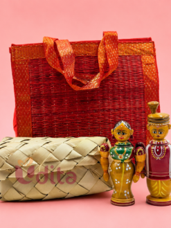 Traditional Korai bag wedding return gift combo featuring handcrafted Kondapalli bride and groom dolls with eco-friendly palm leaf storage box.