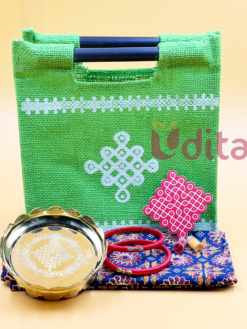 Kolam design jute bag return gift combo with brass lotus stand