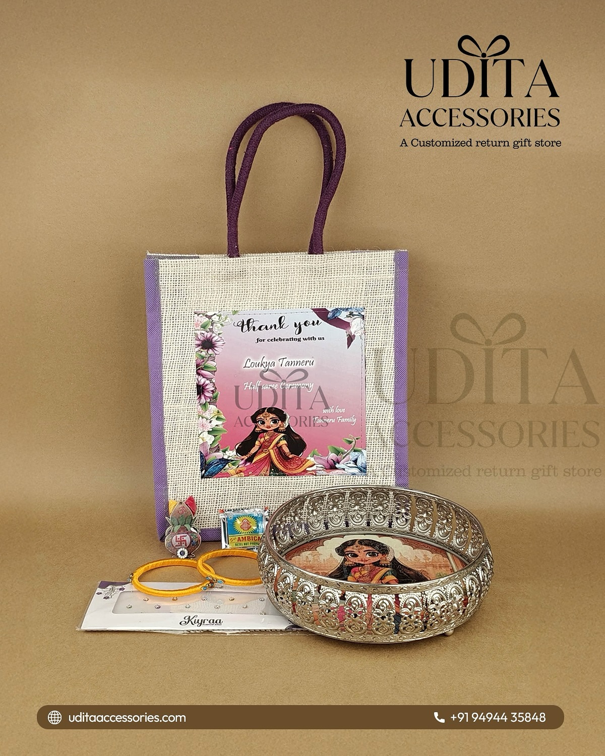 Premium Half Saree Ceremony return gift hamper with customized jute bag, decorative metal tray, silk thread bangles, lotus haldi kumkum, sweet supari packet, and bindi packet.