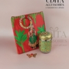 Half Saree Ceremony return gift hamper featuring a customized printed bag, Meenakari decorative storage box, and butterfly haldi kumkum for traditional gifting.