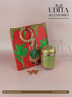 Half Saree Ceremony return gift hamper featuring a customized printed bag, Meenakari decorative storage box, and butterfly haldi kumkum for traditional gifting.
