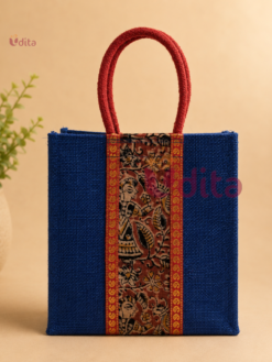 Premium Kalamkari jute bag with braided rope handles, eco-friendly reusable return gift bag featuring traditional Kalamkari artwork, available in assorted colours for weddings, festivals, housewarming, and corporate gifting.