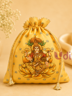Lakshmi printed silk potli bag featuring Goddess Lakshmi seated on a lotus with elegant drawstring closure, ideal for Varalakshmi Vratham, Lakshmi Pooja, temple functions, weddings, and devotional return gifts.