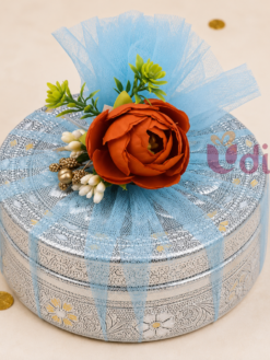 Premium Meenakari box return gift hamper with elegant decorative floral gift packing.