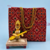 Eco-friendly engagement return gift hamper with handcrafted Kondapalli doll and reusable fabric gift bag.