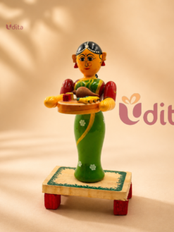 Traditional handmade Kondapalli wooden doll featuring an Indian woman holding a tray, ideal for return gifts and home décor.