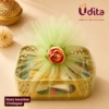 Lotus print metal tray return gift hamper with brocade blouse piece, Haldi Kumkum set and glass bangles