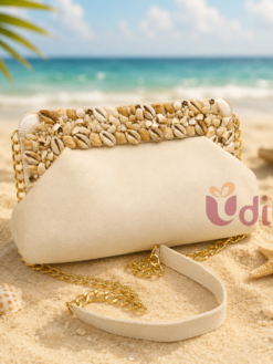 Cream seashell embellished clutch bag with pearl detailing and gold chain strap for women