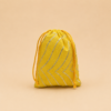 6 inch yellow potli bag with silver zari design